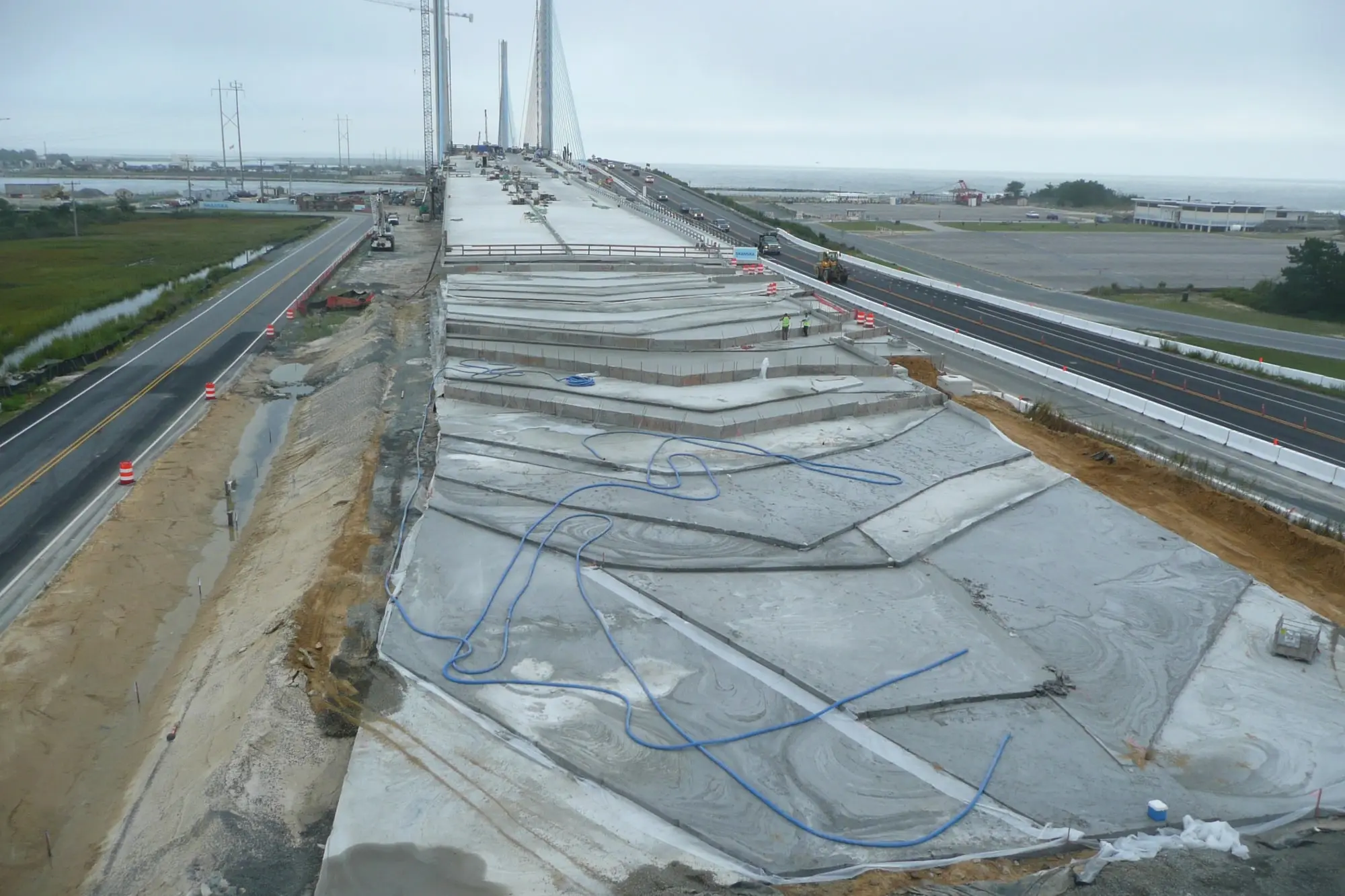 Elastizell Systems applying lightweight cellular concrete to install a roadway sub-base in Norfolk, Virginia, for enhanced stability and suppor