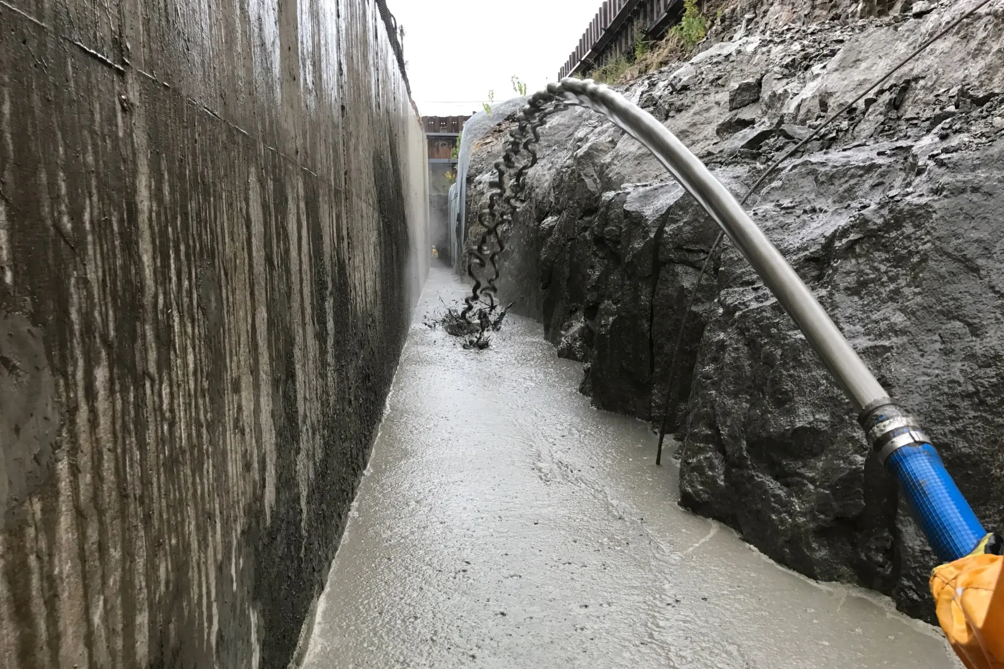 Elastizell Systems building and stabilizing a retaining wall using lightweight cellular concrete in South Bend, Indiana